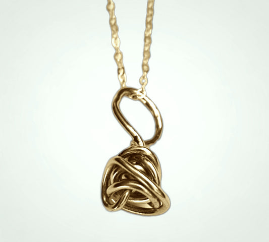 Winding knot necklace in 14K gold