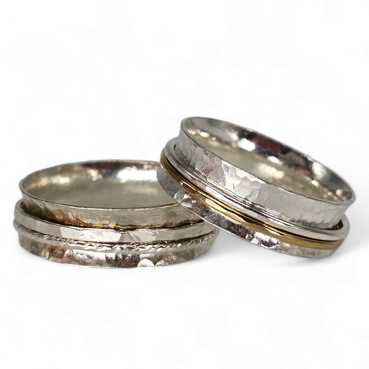 2 Silver spinner anxiety ring on a white background.
