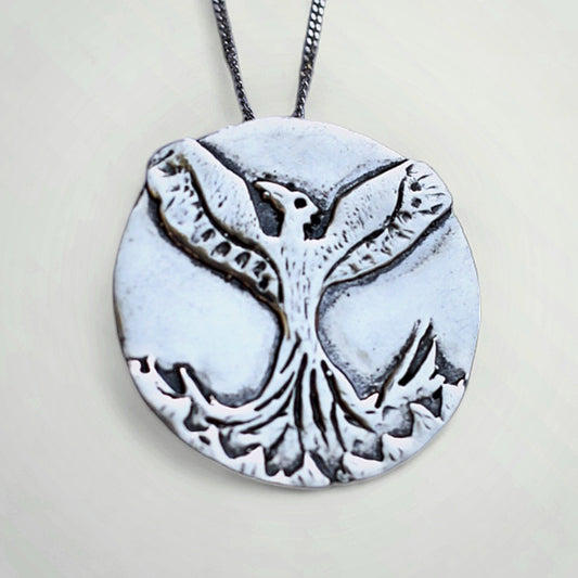 Sterling silver handcrafted Phoenix necklace as a symbol of resilience