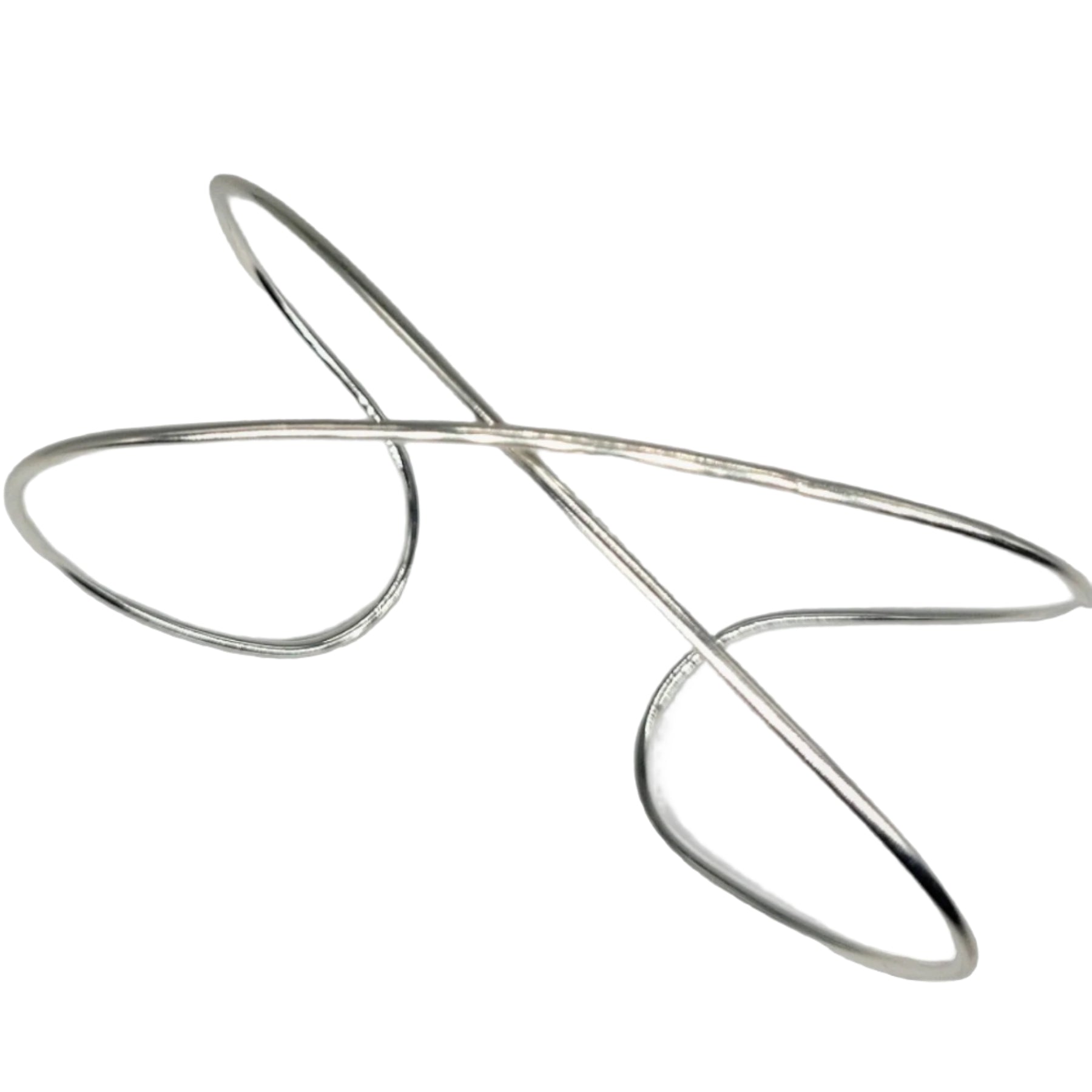 Handmade Sterling Silver Infinity bracelet on a white background.