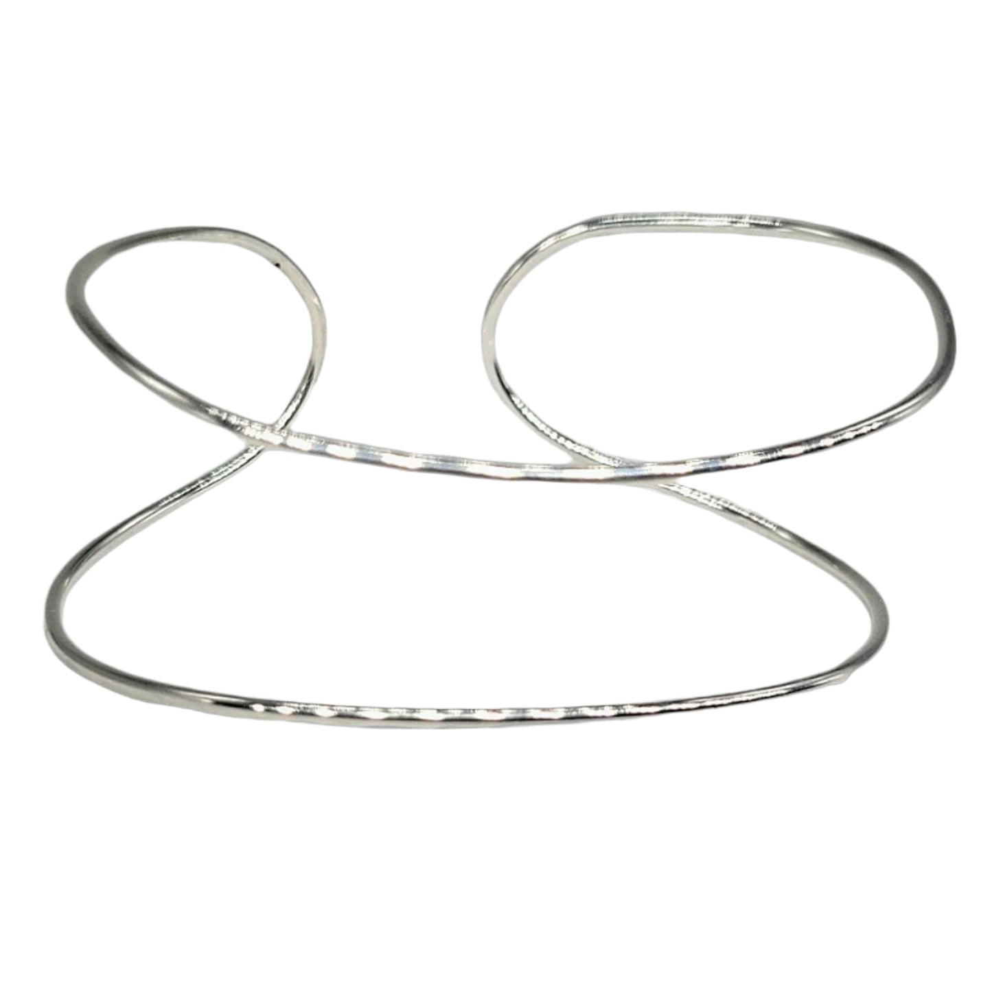 Space Between adjustable cuff bracelet layin on it's side