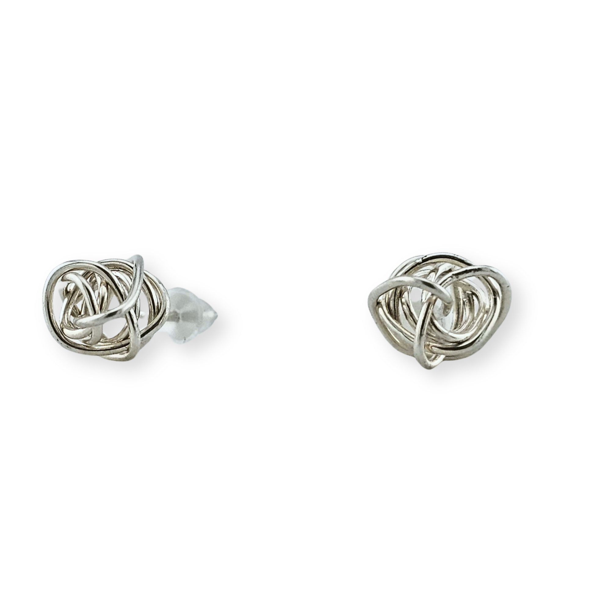 Close up of Silver Winding Knot Stud Earrings by Jaclyn Nicole