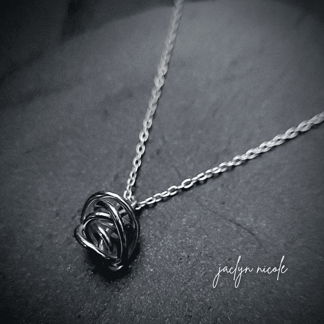 Sterling Silver handmade Winding knot necklace for resilience