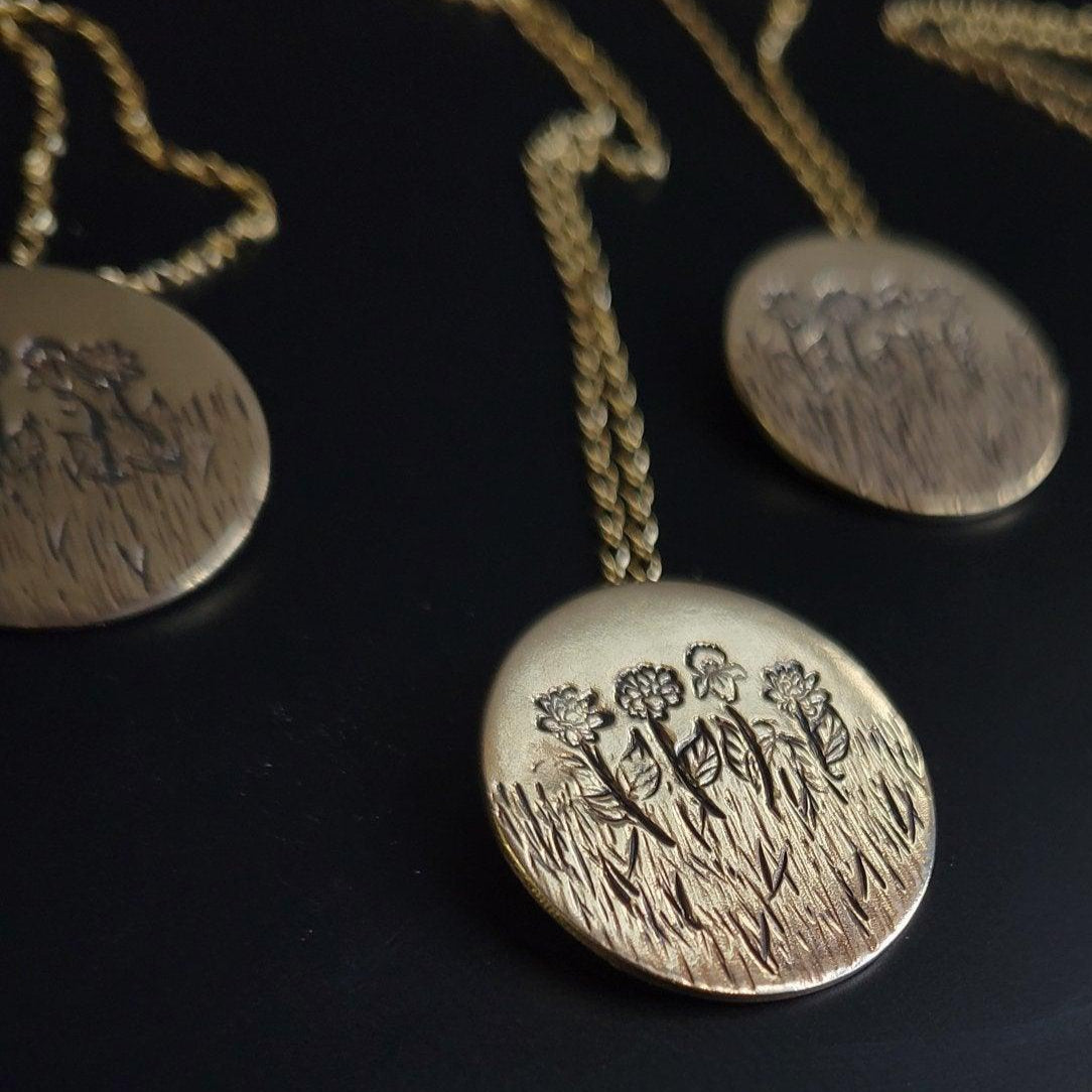 Handcrafted Birth Month Flower Pendants for gifts for sisters in Brass