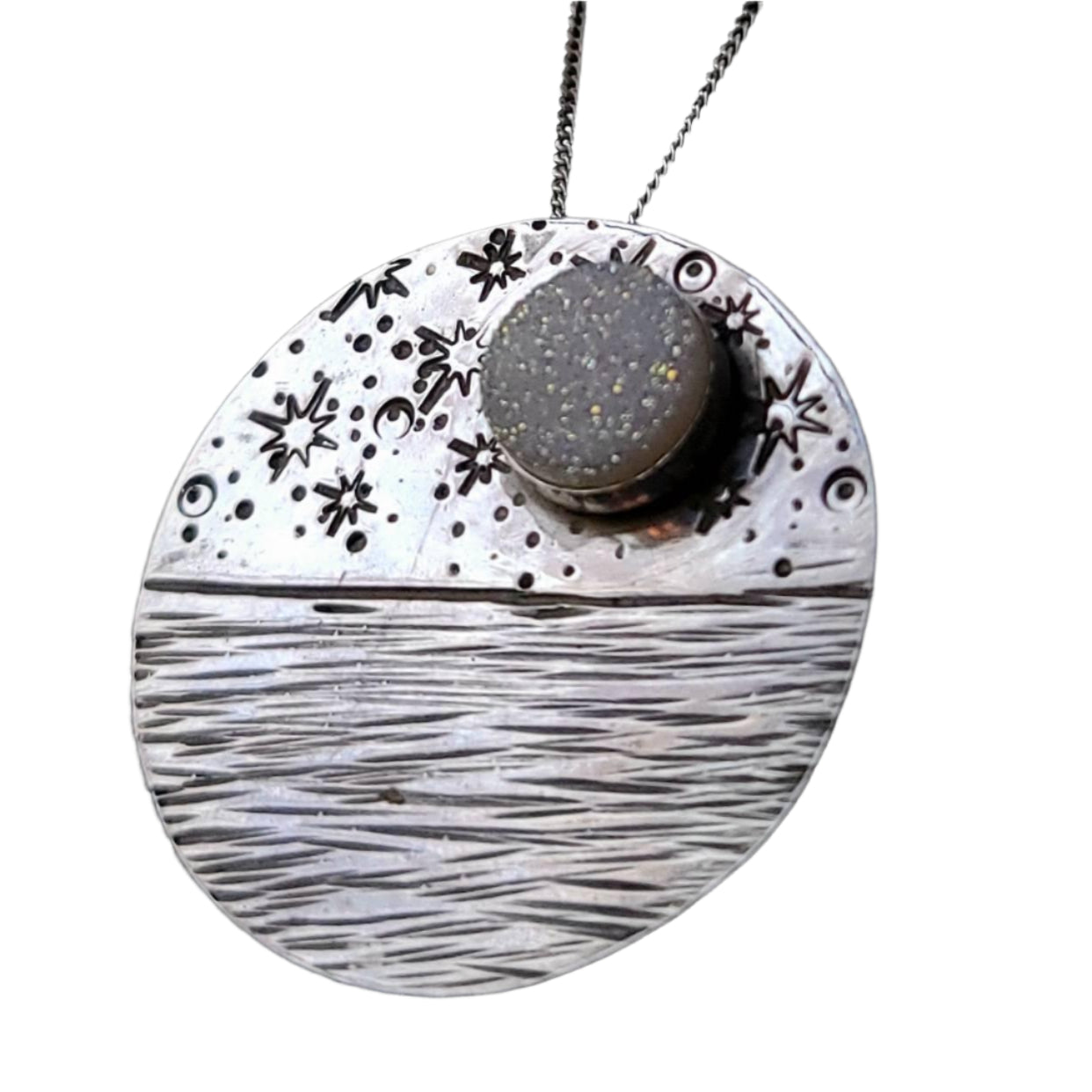 Reflections Moon Necklace - Symbols of Strength & Resilience - displayed on black velvet jewelry display.
