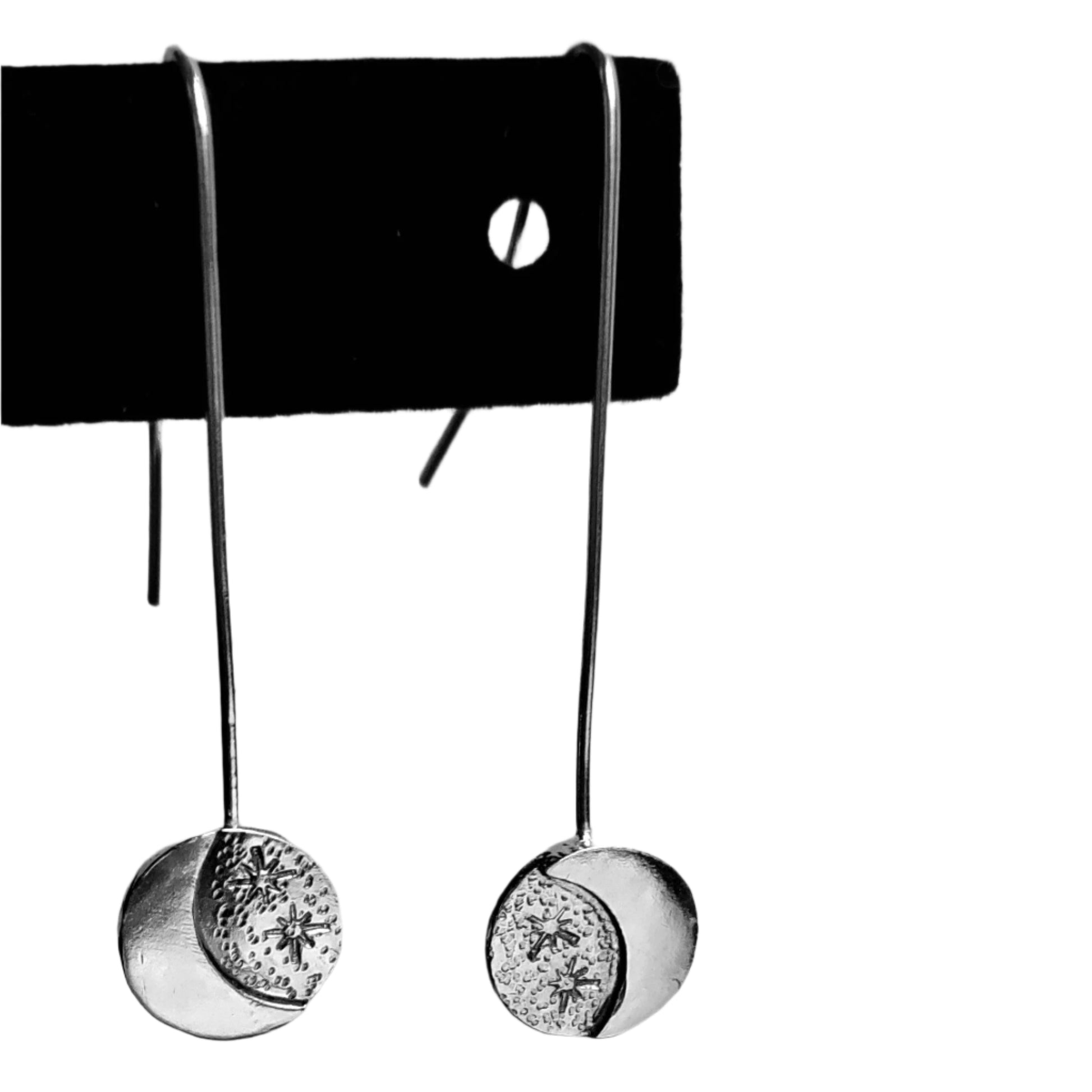 Close up of Stars and Moon Earrings in sterling silver by Jaclyn Nicole.