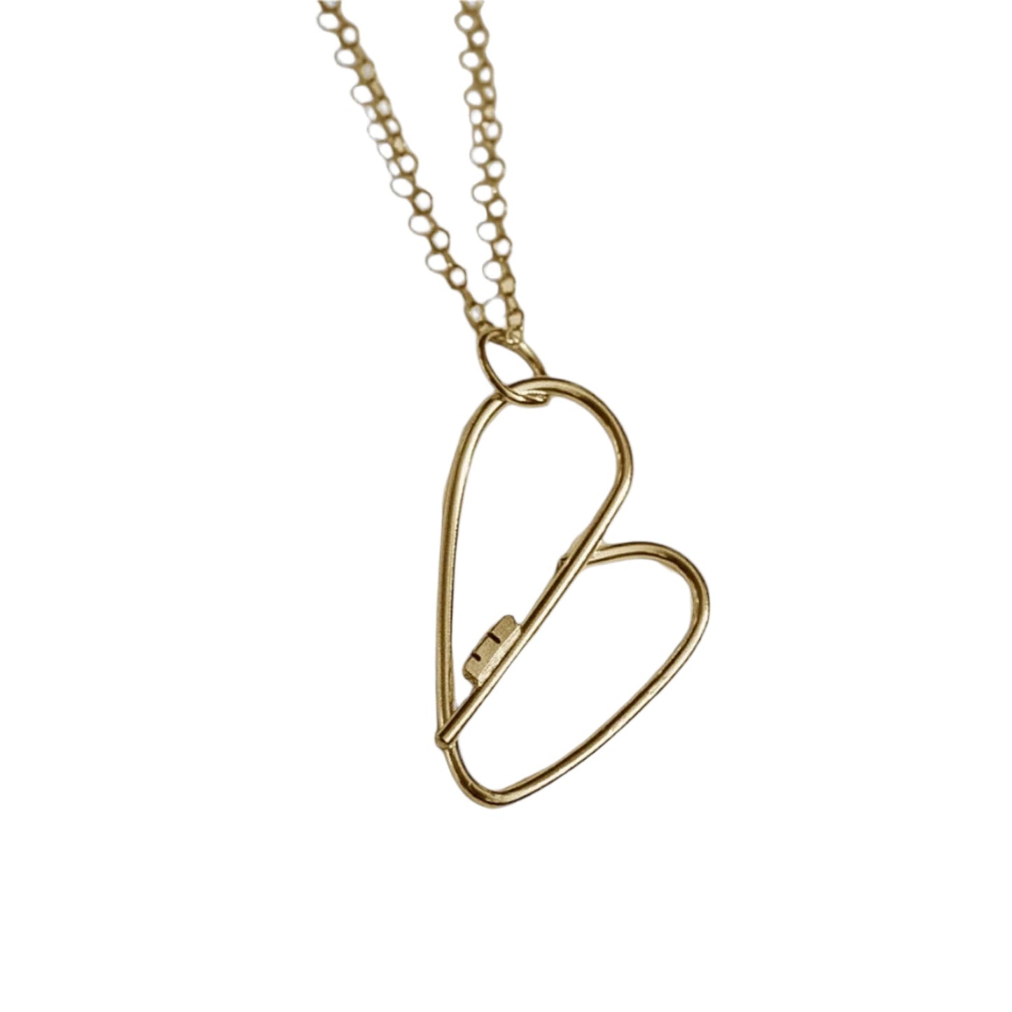 A 14K gold heart necklace with a key in the middle on a white background.