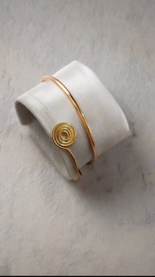 14K Gold Cuff Bracelet with meaning on jewelry display