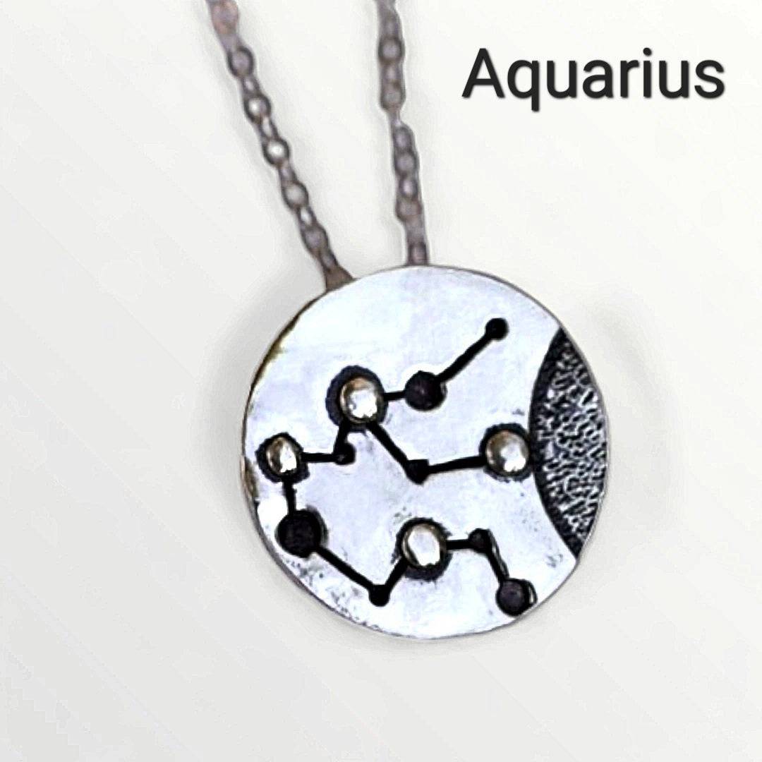 Silver Aquarius zodiac necklace by inspirational jewelry artist Jaclyn Nicole