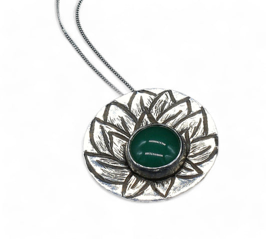 Single layer hand textured lotus flower necklace in sterling silver set with an aventurine crystal by inspirational jewelry artist Jaclyn Nicole