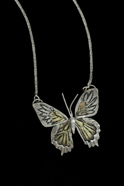 Butterfly Necklace symbol of transformation handcrafted by Jaclyn Nicole who fabricates meaningful jewelry for mindfulness 