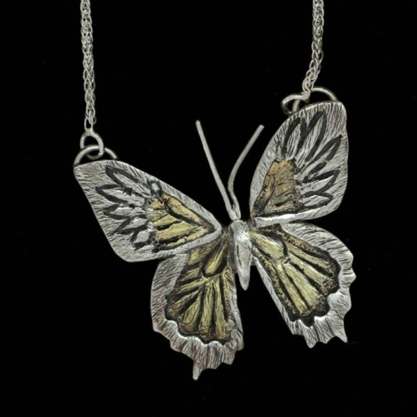 Butterfly Necklace symbol of transformation handcrafted by Jaclyn Nicole who fabricates meaningful jewelry for mindfulness 