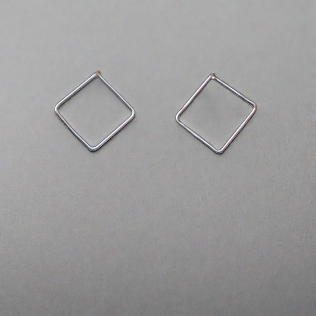 silver box breathing earrings studs to practice breathing techniques.