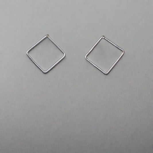 silver box breathing earrings studs to practice breathing techniques.