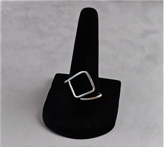 Box breathing minimalist ring, adjustable to fit most fingers, intended to inspire calming exercises when overwhelmed or anxious