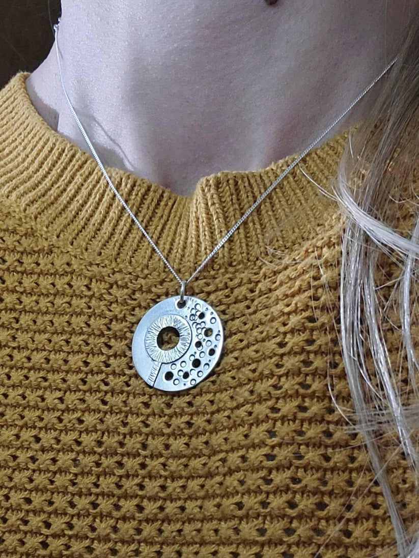 Detail of the Bubble Necklace, a unique stress relief tool to remember to breathe deeply when anxious