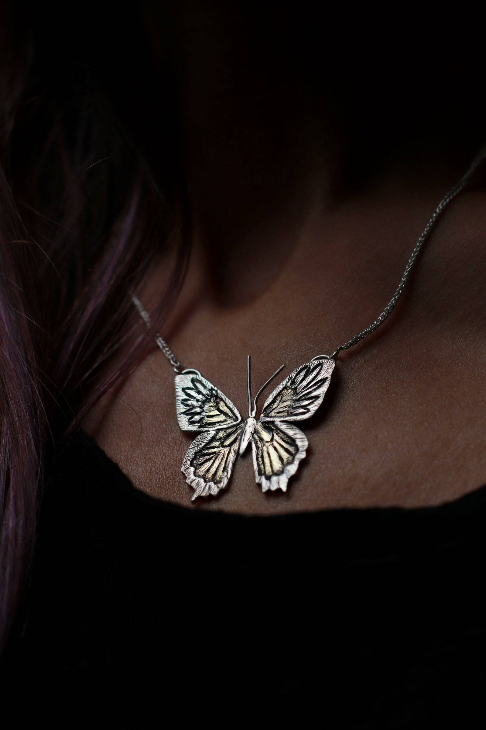 One of a Kind Butterfly Necklace for women worn around a woman's neck