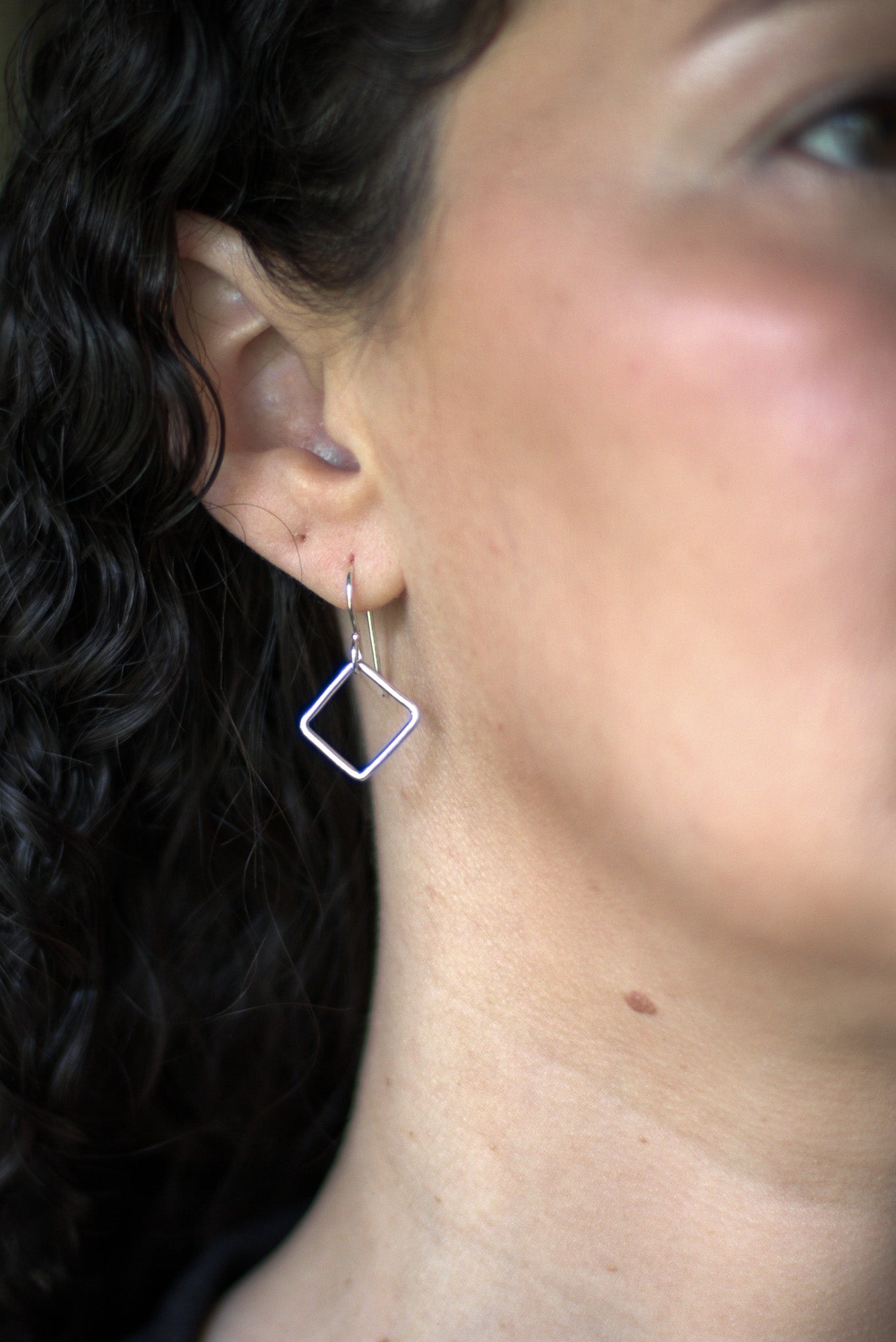 Reminders of the power of breathwork in dainty earrings using the box breathing technique