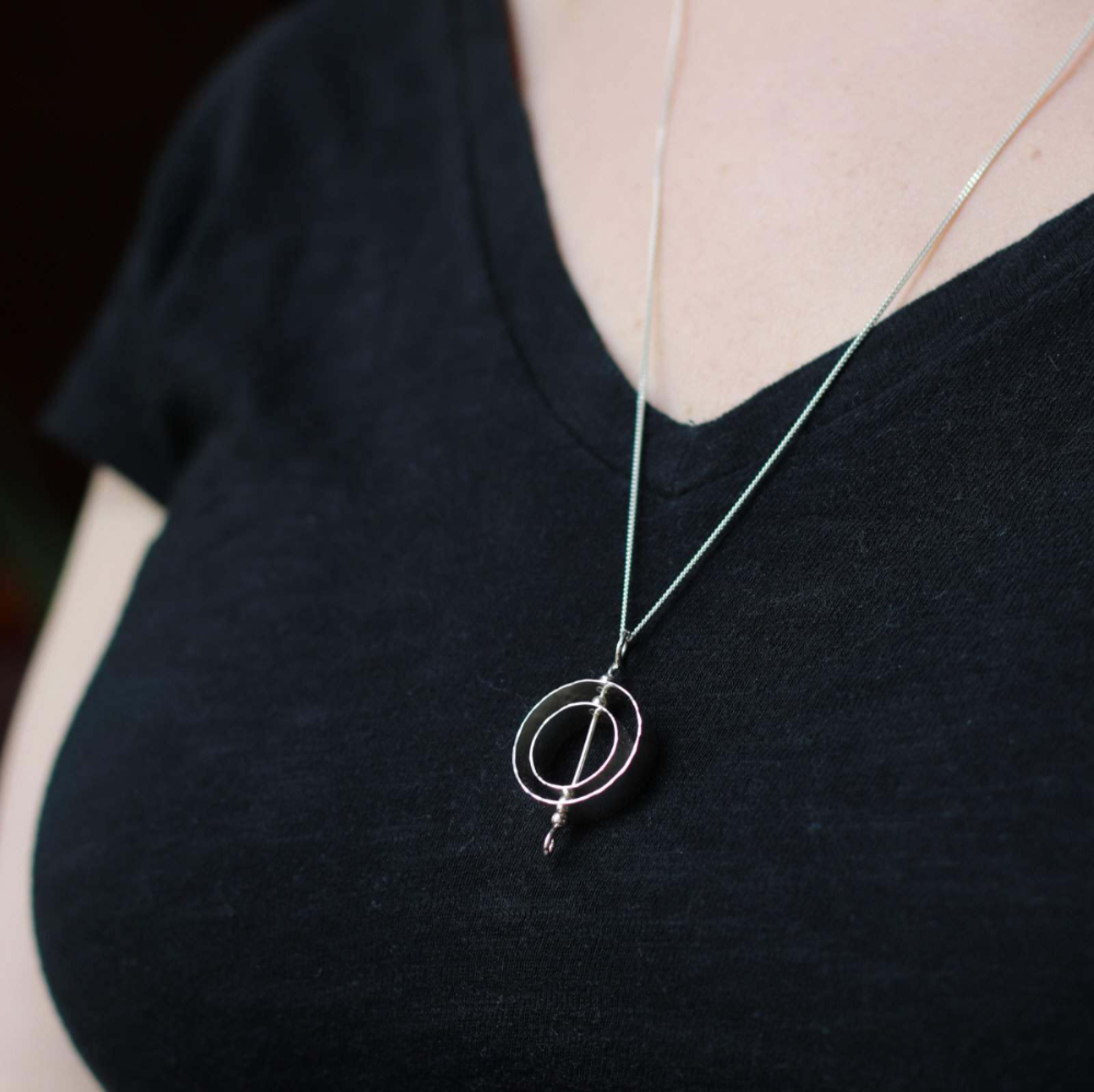Silver Karma Necklace by Jaclyn Nicole