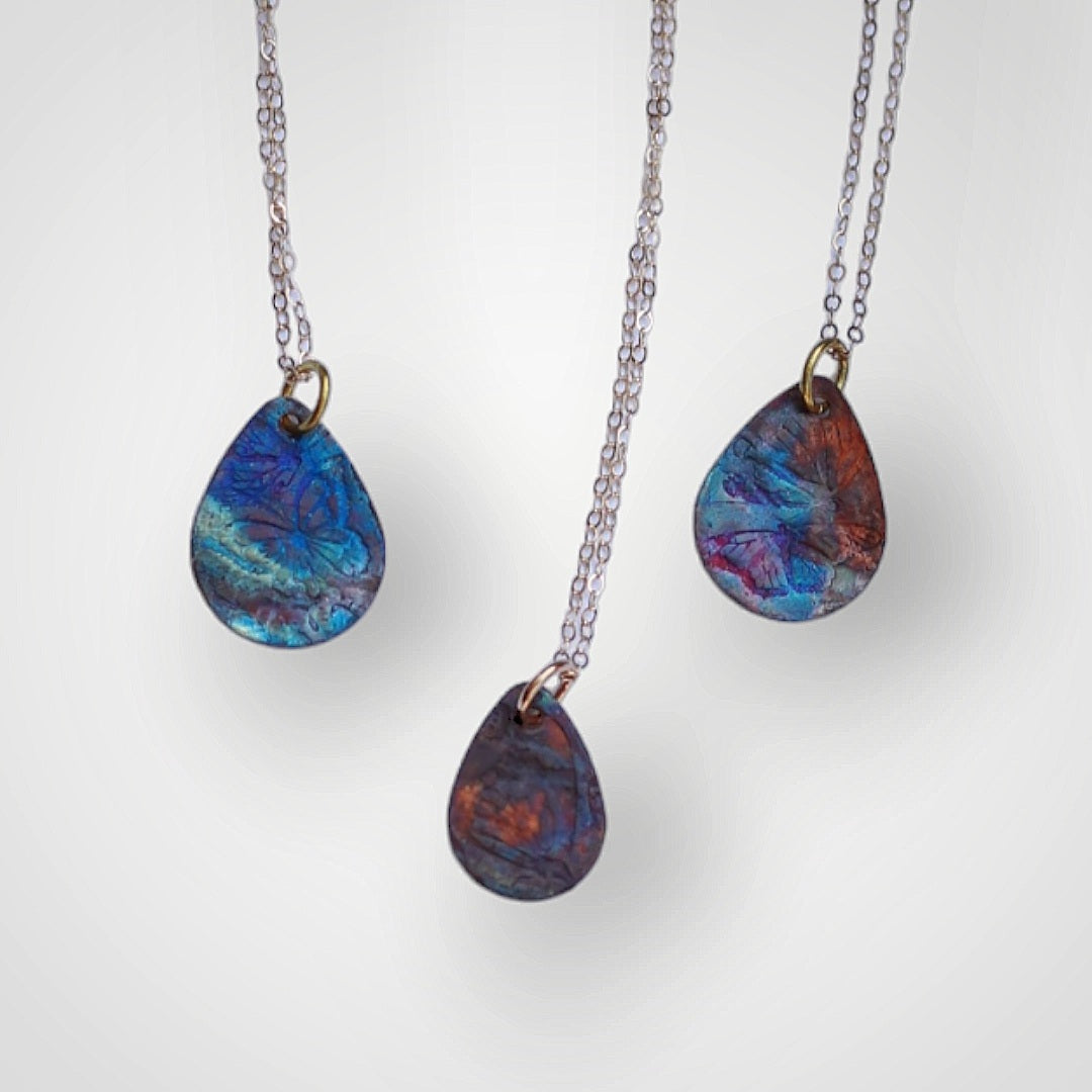 Unique flame painted copper necklaces that reminds you to find beauty in unexpected places.