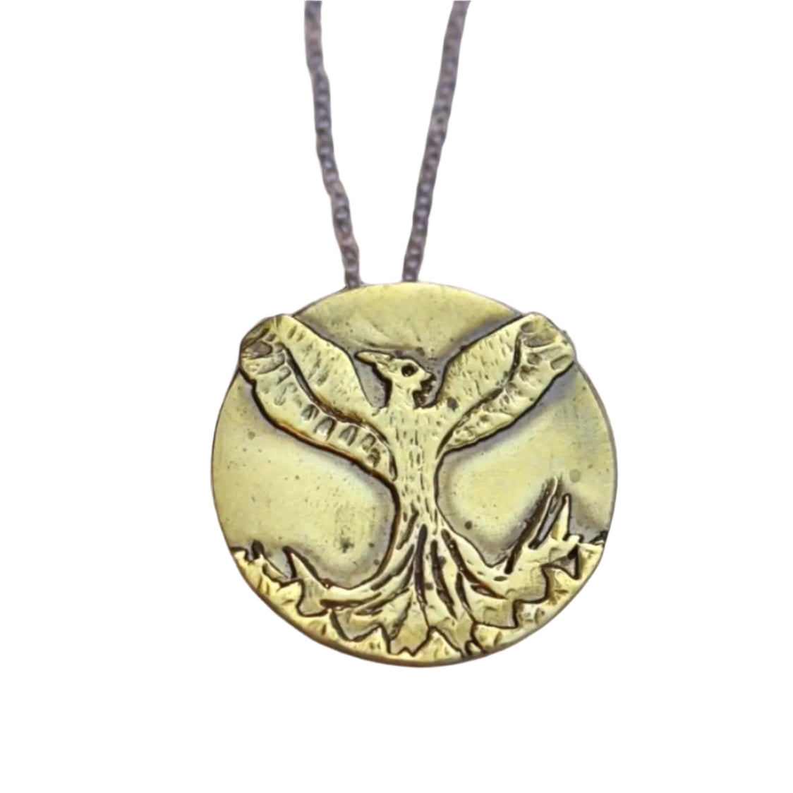 Handcrafted gold Phoenix necklace on a white background