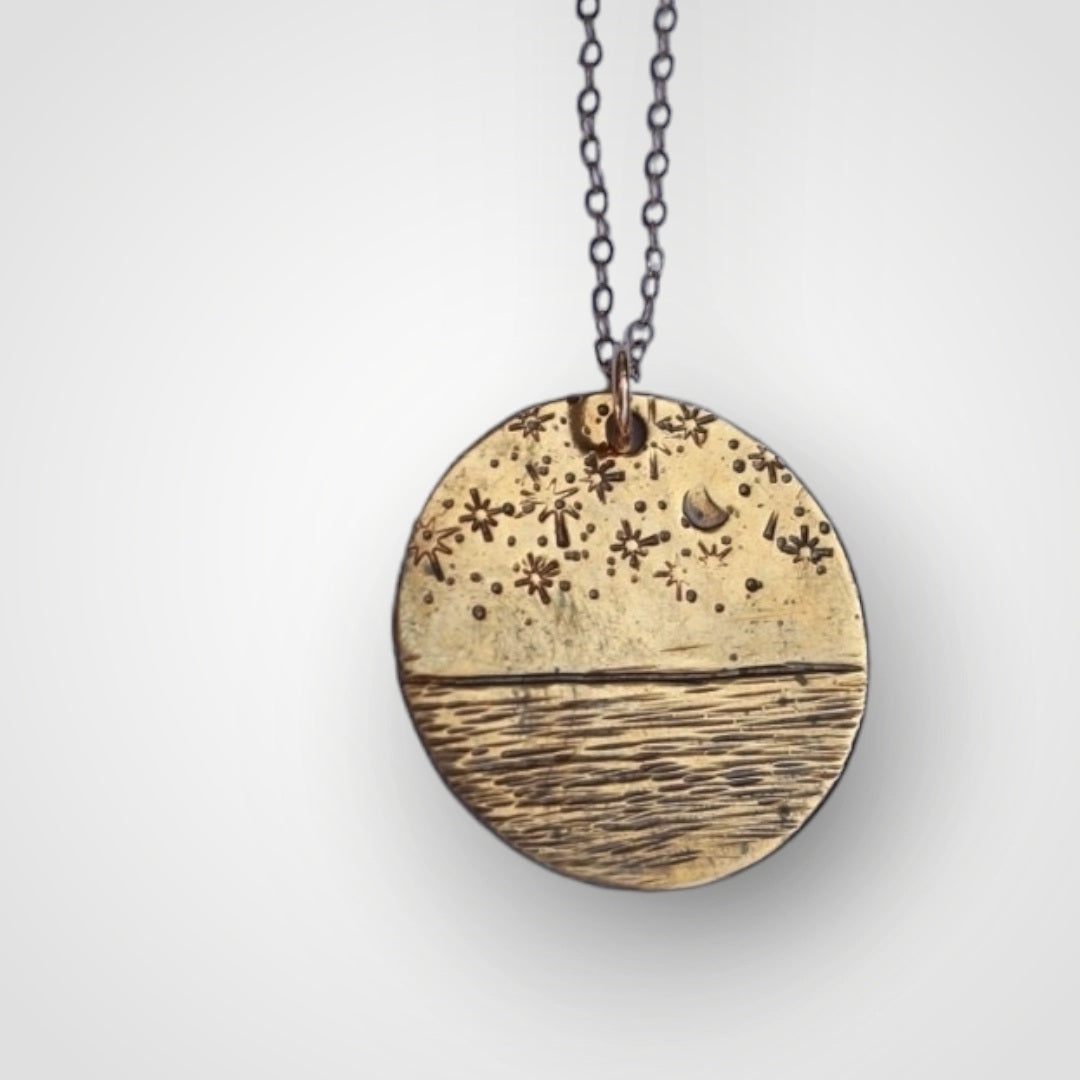 Handcrafted 14K gold moon necklace that reminds you to reflect on your prior successes to overcome present challenges.