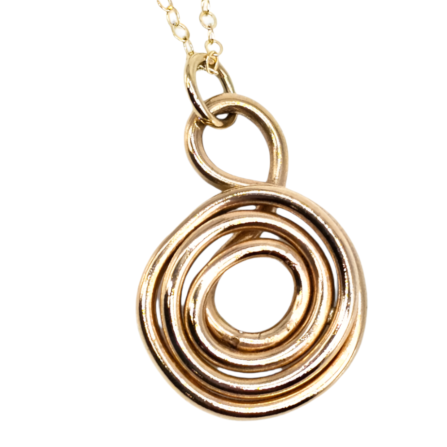 14K Gold wire g shaped love and gratitude necklace pendant on chain on a white background.