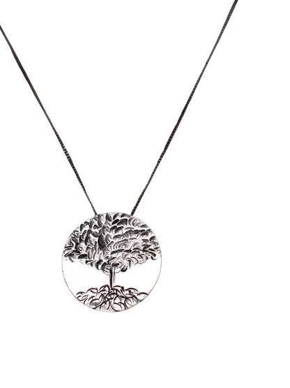 Handcrafted Tree of Life necklace in sterling silver by inspirational jewelry artist Jaclyn Nicole.