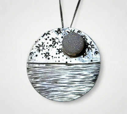 Handmade sterling silver moon necklace that reminds you to reflect on your prior successes to overcome present challenges.