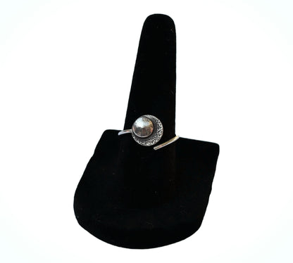 Moon ring that reminds you to reflect on your prior successes to overcome present challenges.