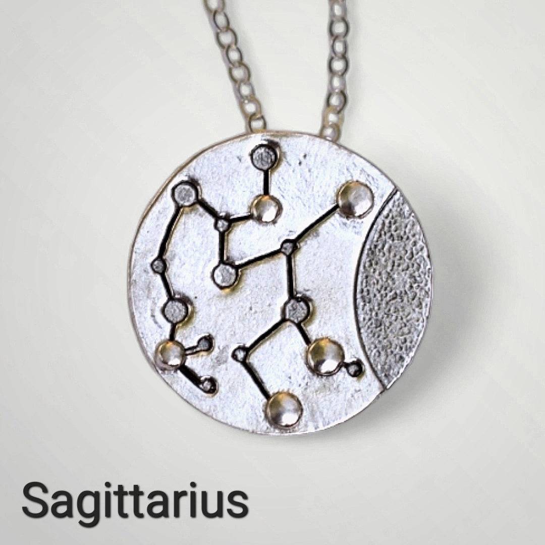 Silver Sagittarius zodiac necklace by inspirational jewelry artist Jaclyn Nicole