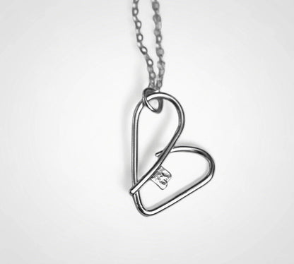 Our sterling silver key heart necklace reminds you that self-love is the key to your happiness.