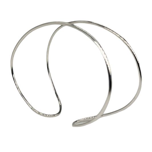 Close up of silver Space Between Cuff Bracelet