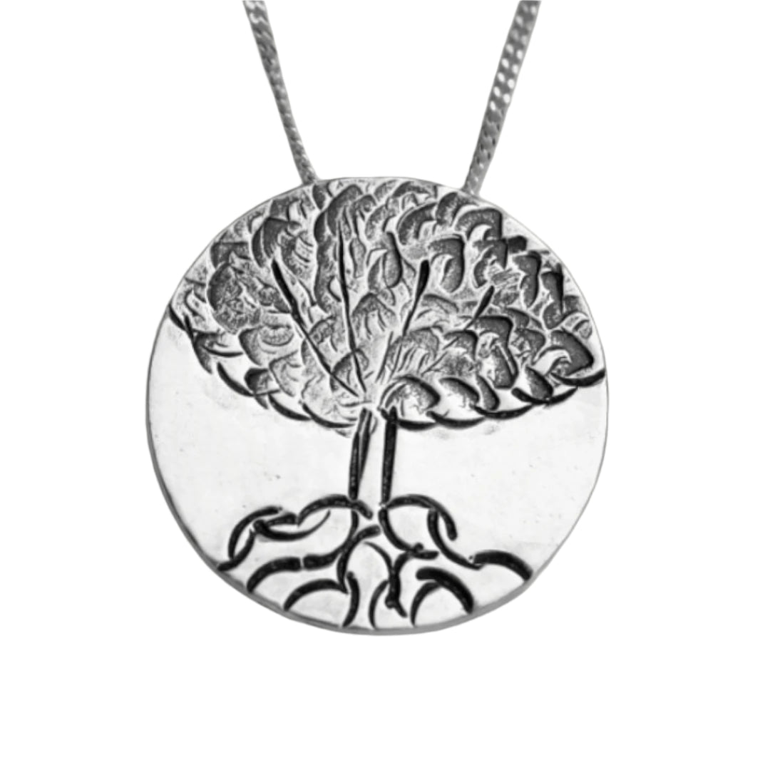 Handcrafted sterling silver Tree of Life necklace by inspirational jewelry artist Jaclyn Nicole.