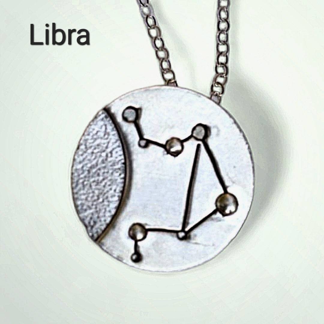 Silver Libra zodiac necklace by inspirational jewelry artist Jaclyn Nicole
