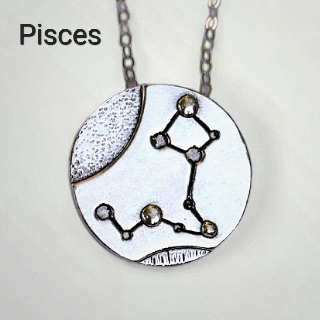 Silver Pisces zodiac necklace by inspirational jewelry artist Jaclyn Nicole