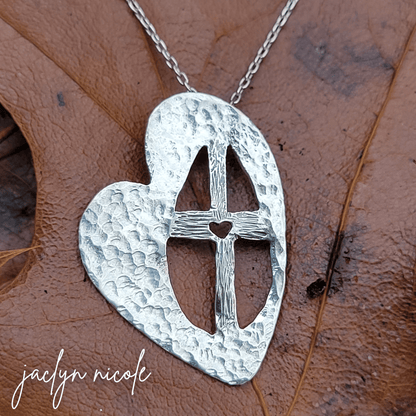 Hand fabricated Catholic cross necklace for loving kindness, a piece of unique Christian jewelry