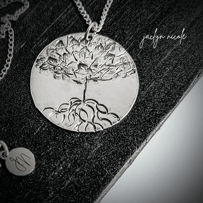 Handcrafted sterling silver Tree of Life necklace by inspirational jewelry artist Jaclyn Nicole.