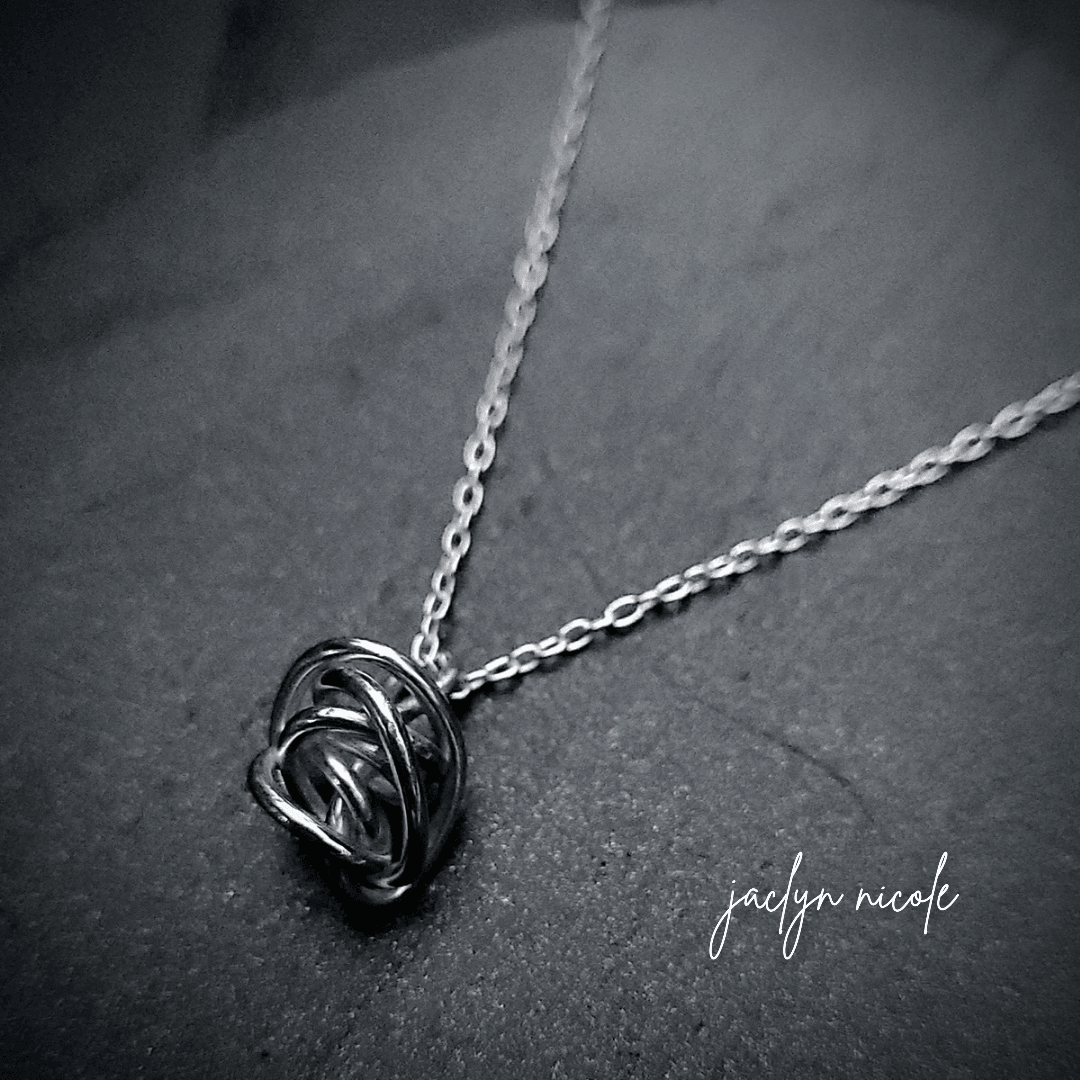 Sterling Silver handmade Winding knot necklace for resilience