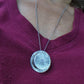 Manifestation Vessel Necklace with handwritten intention paper on a woman's neck  - Jaclyn Nicole
