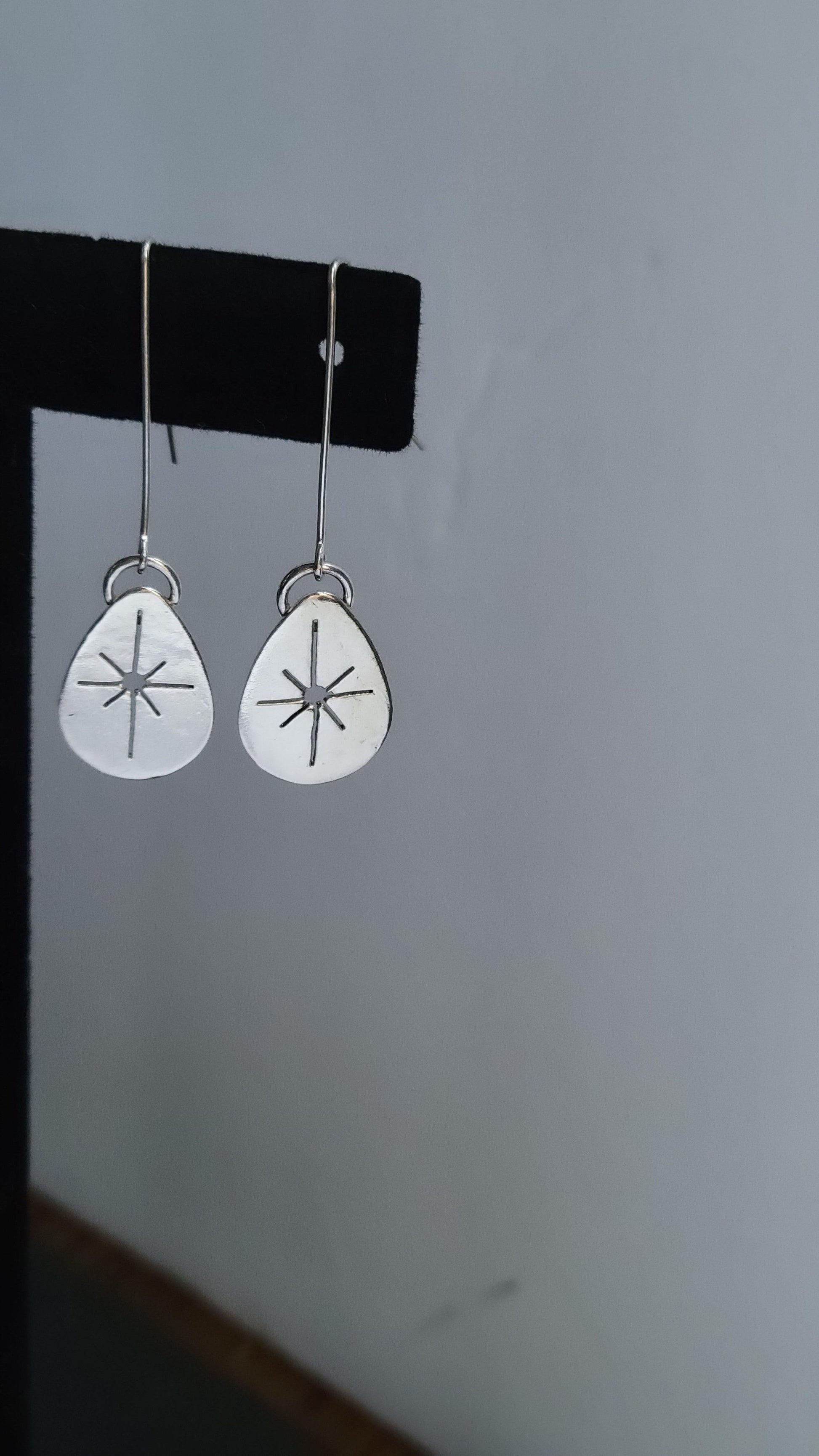 star burst sun drop earrings in sterling silver 