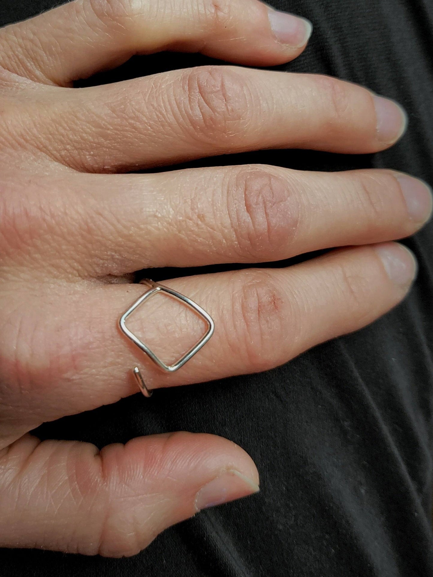 Box Breathing adjustable rings that remind you to use breathing exercises to find calm when anxious or overwhelmed. 
