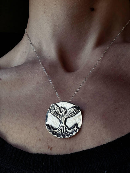 Handcrafted phoenix necklace symbolizing personal transformation