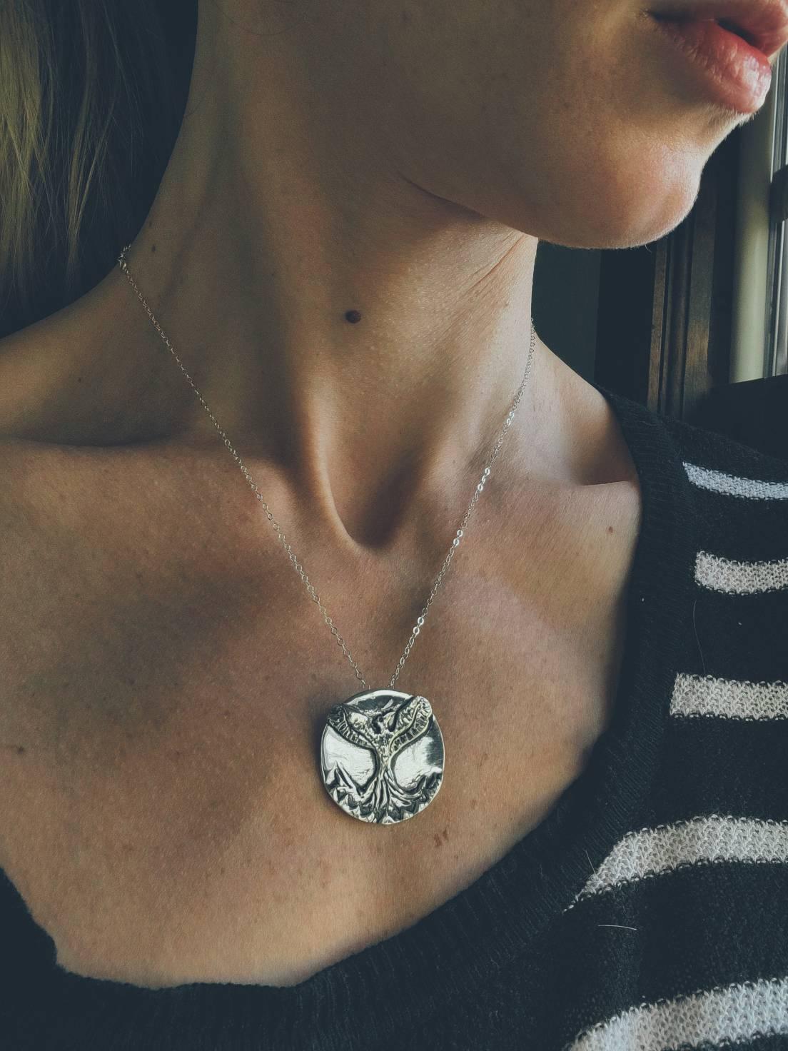 Empowering phoenix necklace for overcoming adversity