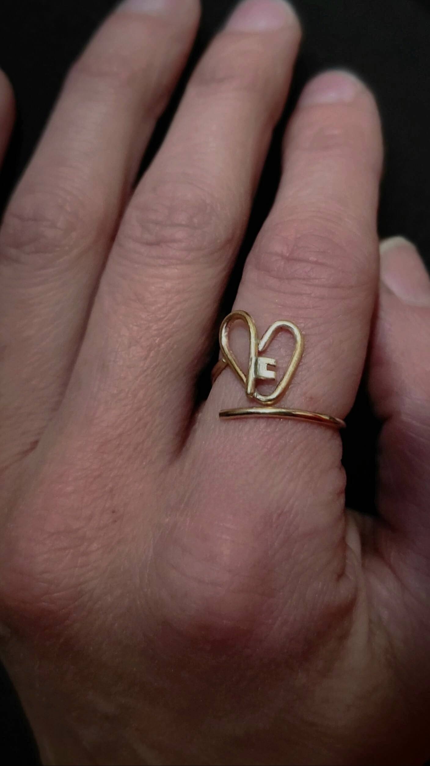 Our gold key heart ring reminds you that self-love is the key to your happiness.