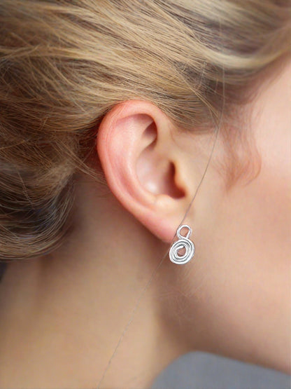 Gratitude Symbol Earrings on a woman's ear - Lightweight & Meaningful Jewelry for every day wear - Jaclyn Nicole